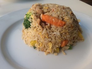 A clean plate of Spicy Basil Fried Rice.