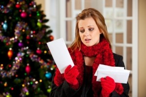 People are buying a lot of gifts for others during the holiday season and are stressing when the bills come. Photo Credit: www.redwigwam.com